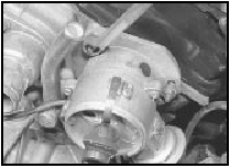4.9a On non-TU series engines, unscrew the mounting nuts . . .