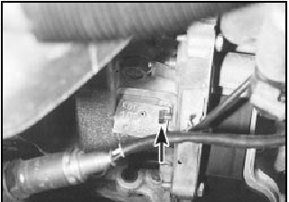 3.4 Insert a 6 mm bolt (arrowed) through hole in cylinder block flange and