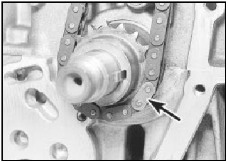 4.20 Timing chain bright link (arrowed) positioned over crankshaft sprocket