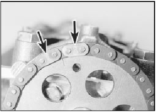 4.21 Camshaft sprocket timing mark positioned between two bright links
