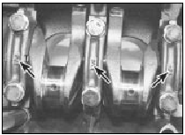 8.14 Main bearing cap identification markings (arrowed)