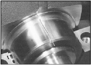 13.26 Plastigage in place on a crankshaft main bearing journal