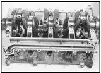 13.39 Lowering the crankshaft into place