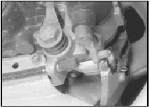 8.4 Handbrake cable attachment at rear brake caliper