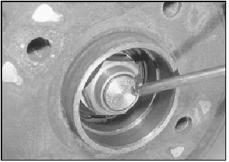 11.9 Lock the hub nut by staking the nut flange into the groove on the stub